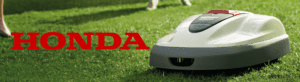 Honda Robotic mower on grass with logo 